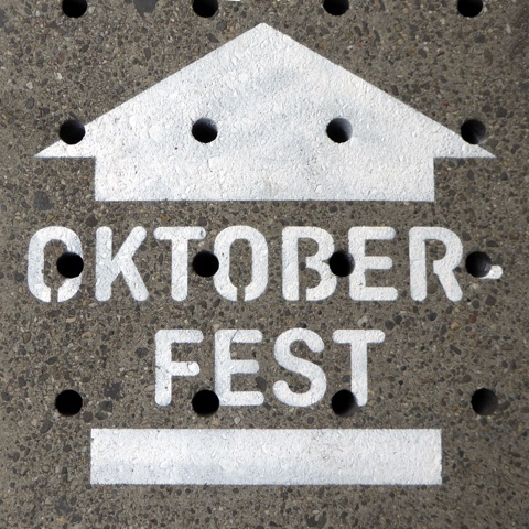 Plain stencil arrow on the ground marking the walk from the station, 2016